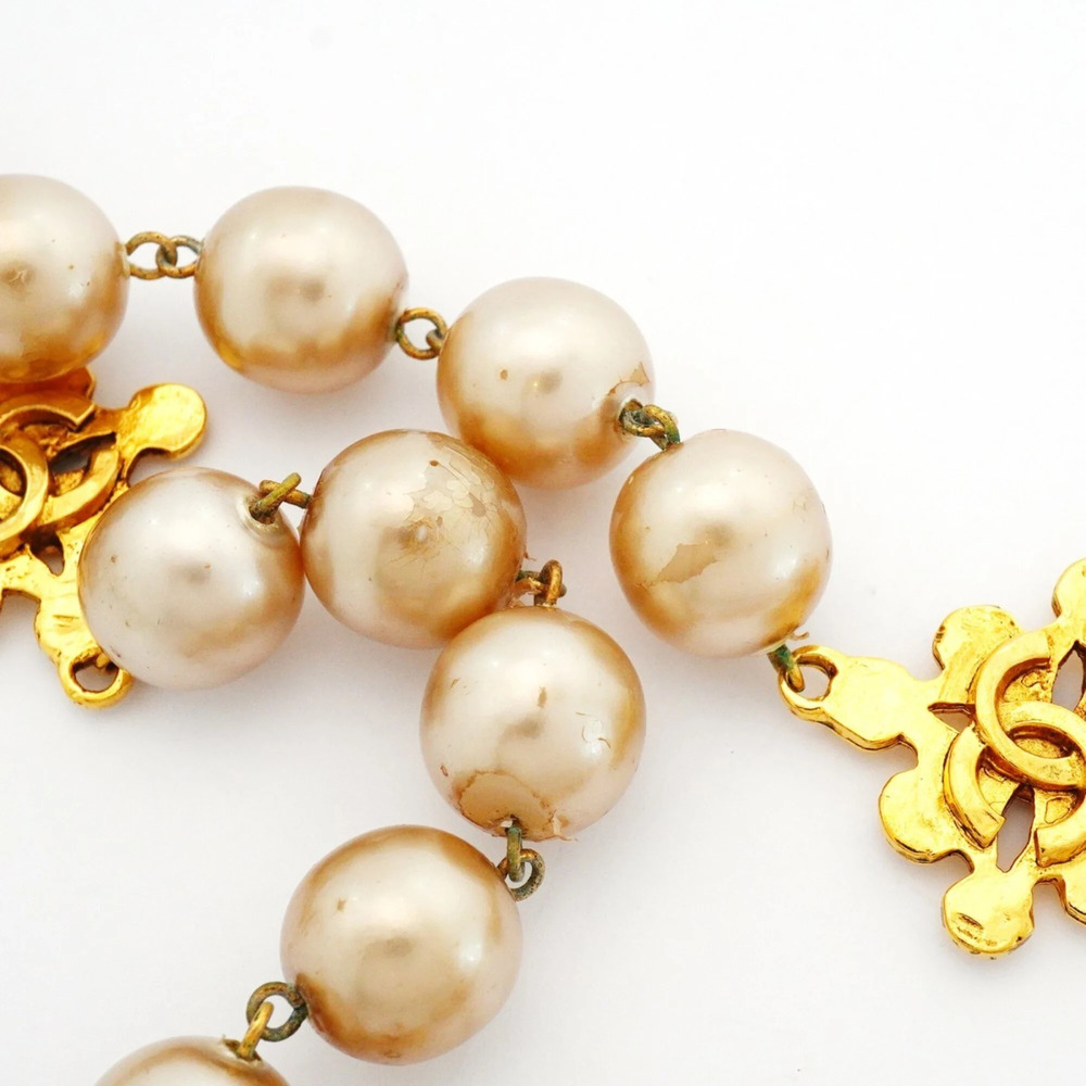 CHANEL Gold Pearl Logo Necklace - Picture 7 of 8